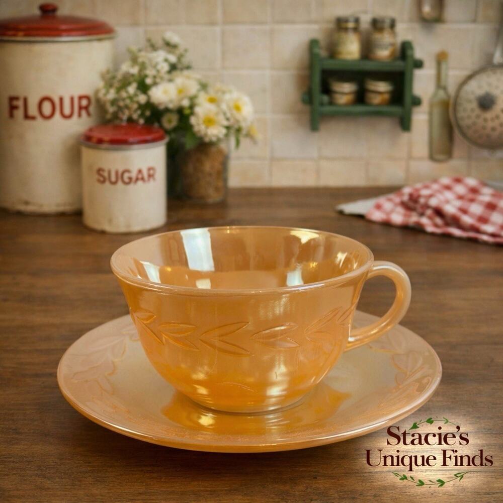 1940's Fire King Ware tea cup and saucer set In Peach Luster